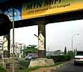 Bridge pillars in Lagos showing Eyo figures