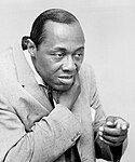 Stepin Fetchit, né Lincoln Perry (1902–1985), pictured in 1959, both criticized as a stereotype and praised as an archetype, was the first Black actor to earn $1 million.