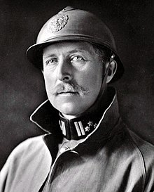 Albert wearing a military uniform with helmet