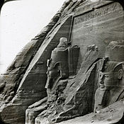 View of the Great Temple's colossal statues from the right, partially excavated