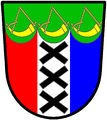 3 saltorels—Tierced per pale, gules, argent and azure, the argent charged with three saltorels in pale, sable; on a chief invected of three pieces vert, three powder horns [stringed] or—Oosthuysen, RSA