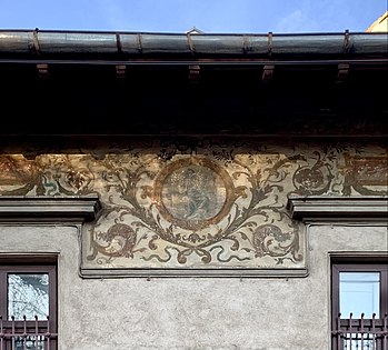 Fresco with cartouches and foliage spirals on the upper part of the facade of Strada Occidentului no. 11, Bucharest, painter: C. Cora, architect: Cesare Fantoli, 1910[56]