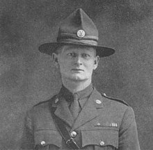 head and shoulders portrait of man in military uniform and hat