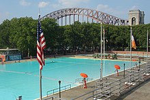 View of the main pool with the Hell Gate Bridge in the background