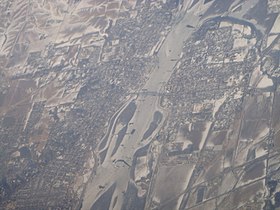 Fulton (right of river) and its neighbor, Clinton, Iowa (left of river) as seen from an airplane