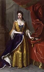 A full length portrait of a pale-skinned woman standing, left arm resting on an orb, itself on a cushion supported by a table. Next to the orb is a crown and sceptre. Thick red curtains frame the woman, who is dressed in yellow. Her right arm holds a violet ermine robe. Stone columns are visible behind her.
