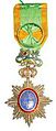 A star badge of the Imperial Order of the Dragon of Annam with the green riband with gold border, used for awarding by French Government.