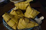 Pusô, made from glutinous rice cooked in pouches of woven coconut leaves