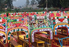 Trajinera boats at the floating gardens of Xochimilco in Mexico City