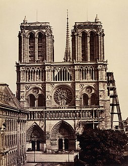 The western façade of Notre-Dame in the early 1860s, towards the end of the restoration. The flèche was rebuilt and the statues of the kings were partially restored.