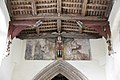 The nave roof with painted angels and other figures