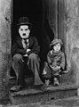 Image 17Charlie Chaplin in his 1921 film The Kid, with Jackie Coogan. (from 20th century)