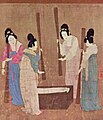 A Tang dynasty painting illustrates women wearing ruqun, with skirts tied above the breasts and short parallel-collar blouses