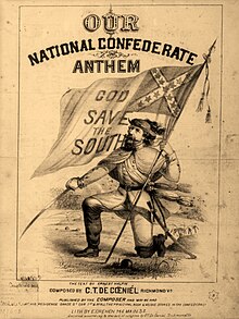 Soldier down on one knee, holding the Confederate flag in one hand and a sword in the other