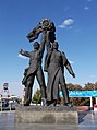 Bronze statue part of the "Friendship Arch", depicting a Russian and a Ukrainian worker holding up the Soviet Order of Friendship of Peoples (pictured in 2011; removed in April 2022 after Russia's invasion of Ukraine)