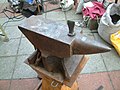 Hardy tool used to cut hot metal in its hardy hole on the anvil