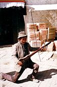 A street musician in Shigatse