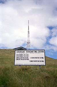 View of the tower from the carpark in 1990, showing old signage.