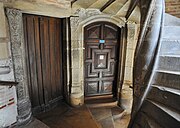 Doors on the ground floor of the stair tower of the Hôtel du Vieux-Raisin (between 1515 and 1528).