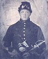 Soldier of a Union army regiment [Bugle horn on cap] although he has no rank he has a Model 1840 army noncommissioned officers' sword