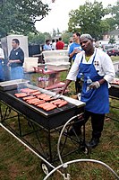 Hot dogs being grilled at National Night Out 2006 - in Phillips West Minneapolis, Minnesota, U.S.