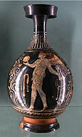 A bottle (Lekythos) in Gnathia style - Eros, with a painting depicting a figure playing with a ball, Apulia (Magna Graecia), Italy, third quarter of the 4th century BC