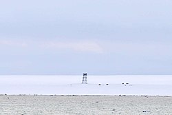 View of the remains of abandoned Izluchina Russian polar station at the northern end of Komsomolets Island