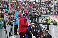 Biathlon coaches use spotting scopes to verify and optimize competitors shot placement