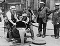 Image 18Prohibition agents emptying barrels of alcohol. (from 1920s)