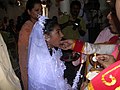 An Indian girl receiving her First Communion