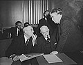 Image 29John L. Lewis (right, President of the United Mine Workers, confers with Thomas Kennedy (left), UMW Secretary-Treasurer of the UMW, and a UMW official at the War Labor Board in 1943 about a coal miners' strike.