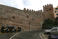 Part of the Moorish city wall with a tower en bec, topped with merlons