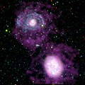 Die Galaxien NGC 4625 und NGC 4618 aufgenommen von GALEX im ultravioletten Licht.
