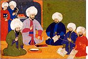 The consultation for the programme of the Şahname-ı Selim Han, with the scholars Şemseddin Ahmet Karabaği, Seyyid Lokman, the writer Ilyas Katib and the painters Nakkaş Osman and Ali, 1571–81 (folio 9r)