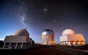 The gleaming dome of the Víctor M. Blanco Telescope is flanked by two telescopes of the SMARTS Consortium in this image from Cerro Tololo Inter-American Observatory