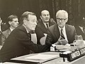 Yugoslav representative Dragoslav Pejić talking to George H. W. Bush at the United Nations Security Council meeting on 14 July 1988.