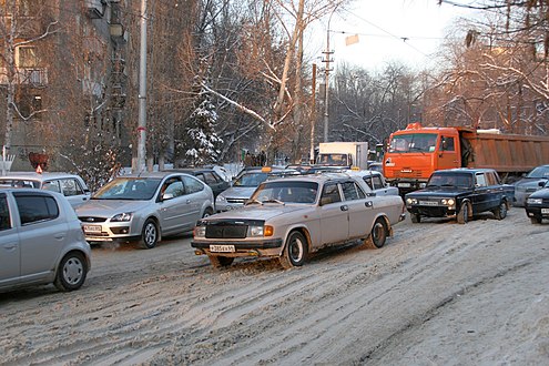 Vehicles in warm, moist, granular snow encounter decreased roadway traction.
