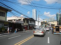 Commercial establishments along the city's main road, Nicanor Domingo Street.