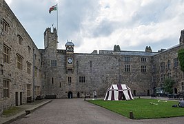 The courtyard and turret clock from the east