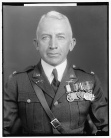 Black and white head and shoulders facing front photo of Lorenzo Dow Gasser in dress uniform with military awards, circa 1930
