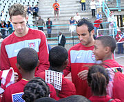 Goodson signing autographs with Landon Donovan during an open training session at the 2010 FIFA World Cup