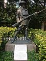 Statue of an anonymous World War I soldier from statuary collection of Eu Tong Sen.[5] Also visible is the Battle of Hong Kong memorial plaque dedicated to all the defenders of Hong Kong in December 1941 through John Robert Osborn.
