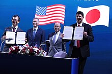 Japan's Ministry of Economy, Trade and Industry Tatsuo Terzawa (left) and US Undersecretary of State Keith Krach (right) sign $10 billion Blue Dot Network energy agreement during the Indo-Pacific Business Forum in Bangkok on 4 November 2019.