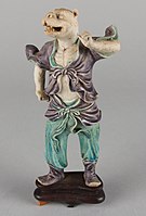 Qing dynasty Chinese zodiac figure, part biscuit, part coloured glazes