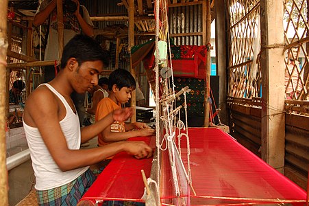 Weaving jamdani on a two-person loom.