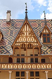 Gothic - Hôtel-Dieu de Beaune, Beaune, France, by Jacques Wiscrère, 1451[28]