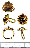 The Escrick ring of gold with a sapphire and glass inset