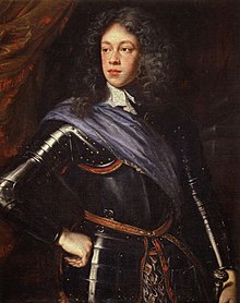 Formal portrait of Mary's father as a young man. He has long bushy hair and a fleshy face, and wears a black suit of armor with a brown shoulder sash.