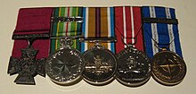 Five medals with their ribbons and clasps, including the Victoria Cross for Australia