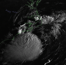 Satellite animation of tropical storm making landfall on North Carolina.